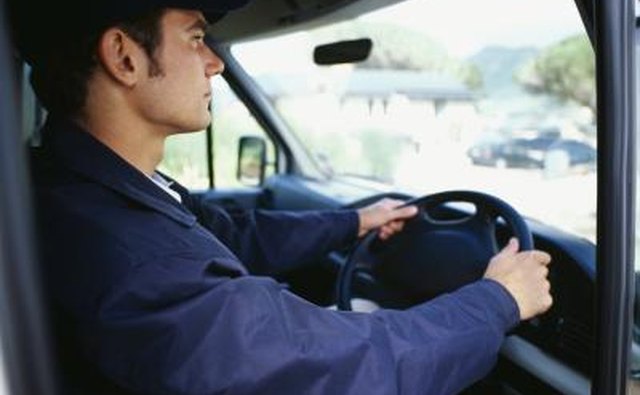 Truck driver behind wheel