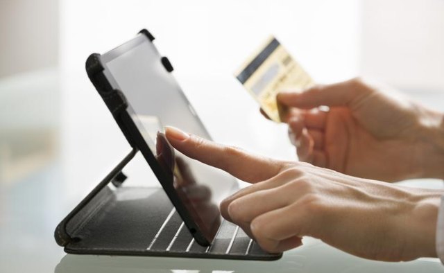 Woman holding giftcard