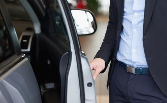 man opening car door