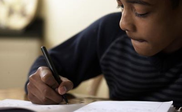 child writing at church