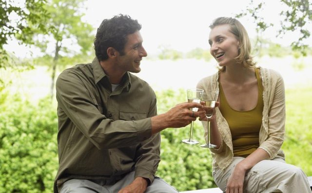 Couple drinking wine.
