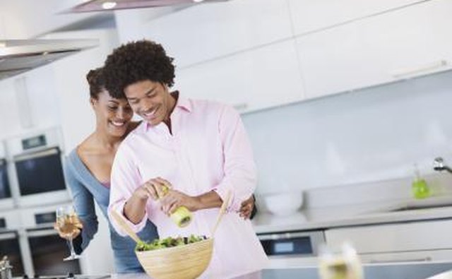 Man cooking for wife