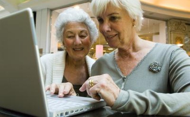 Two women on laptop