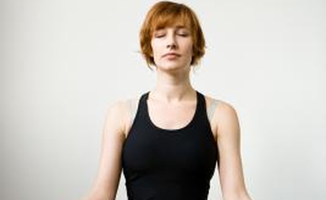 Relax your body as you concentrate on breathing deeply and smoothly.