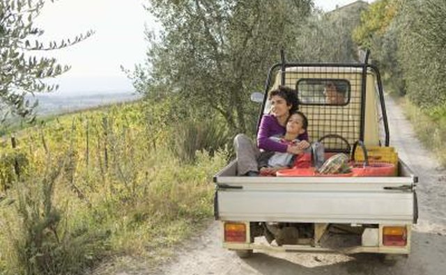 You should consult with local law enforcement about any restrictions with respect to riding in truck beds in your state.