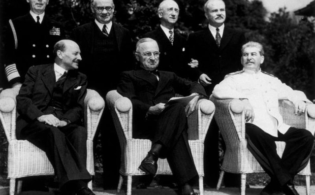 The new 'Big Three' at the Potsdam Conference, after Attlee succeeded Churchill as British Prime Minister. L-R seated: Clement Attlee, Harry S Truman and Joseph Stalin in August 1945.