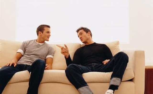 Friends talking on couch