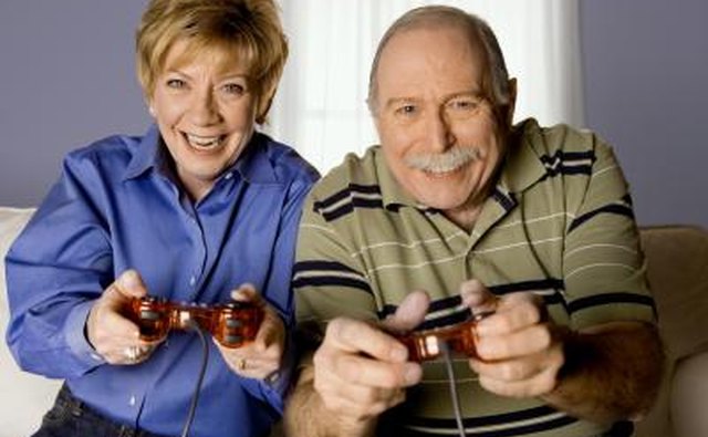 Senior adults enjoy age-appropriate video games.