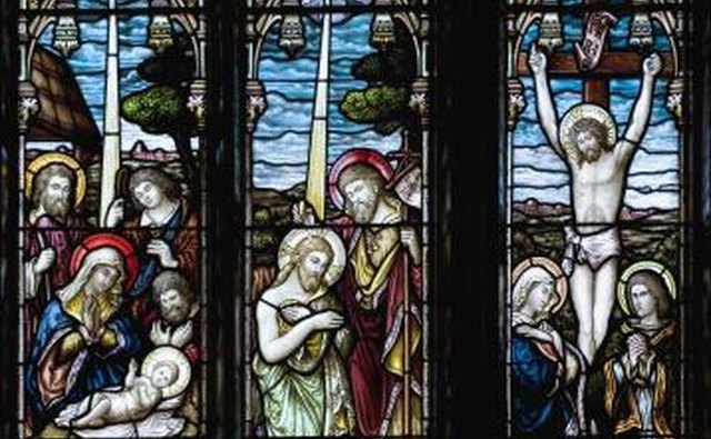 The stained glass scenes often depicted a progression -- in this case from the birth of Christ to his crucifixion.