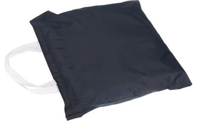 Hand out a canvas bag.