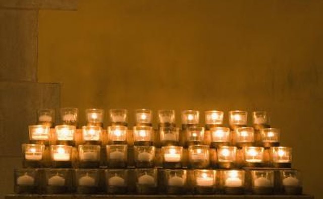 A table of votive candles.