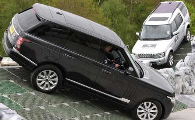 Range Rovers on terrain display