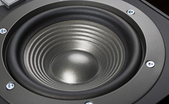 Close up view of a speaker.