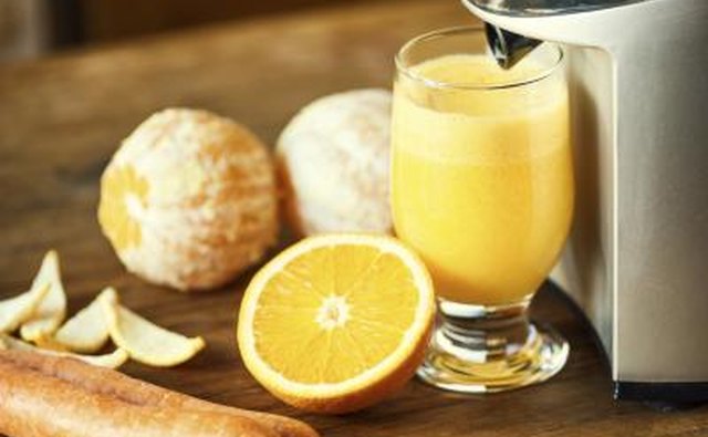 Orange juicer on table.