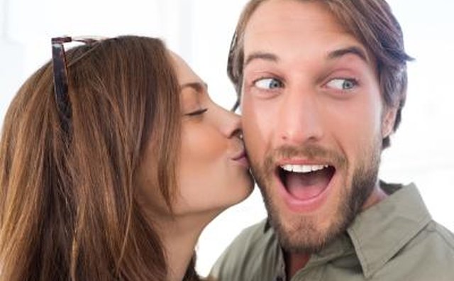 surprise him with a kiss