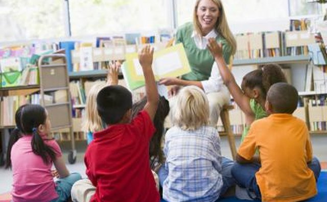 A teacher instructs her students.