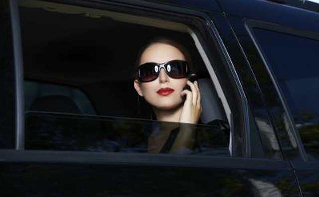 Woman in livery cab.