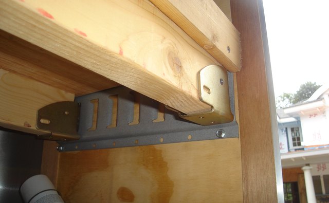 Horizontal E-track with bracket and two by four shelf support