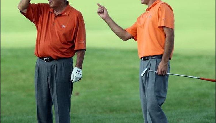 Golfer Sam Saunders with his grandfather, Arnold Palmer.