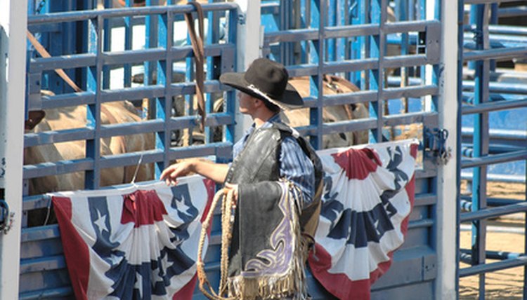 cowboy at a rodeo image by Clarence Alford from Fotolia.com
