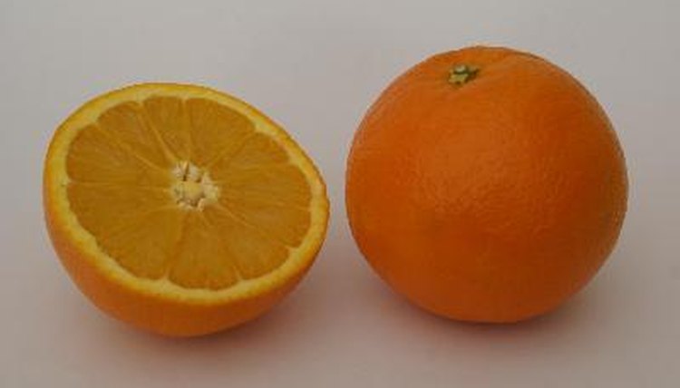 orange. orange and half/ piece image by L. Shat from Fotolia.com