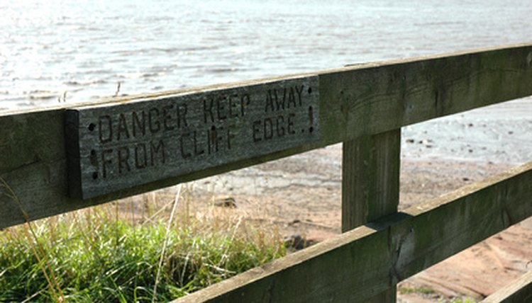 cliff edge sign image by Warren Millar from Fotolia.com