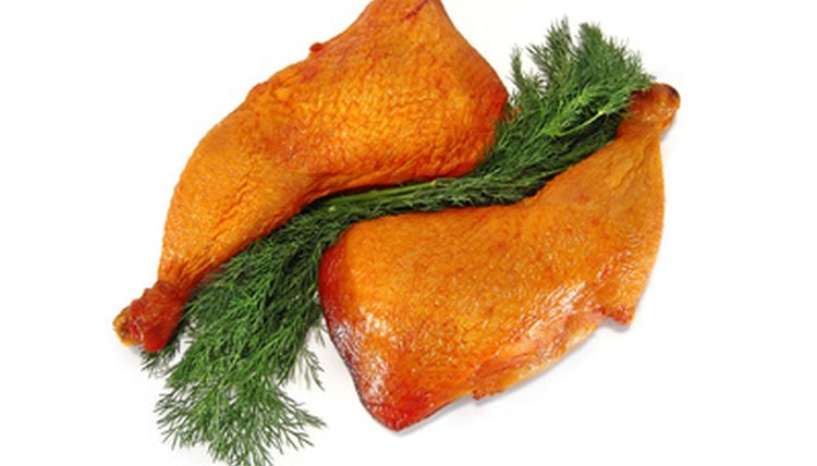 chicken legs on the plate. Isolated on white. image by diter from Fotolia.com