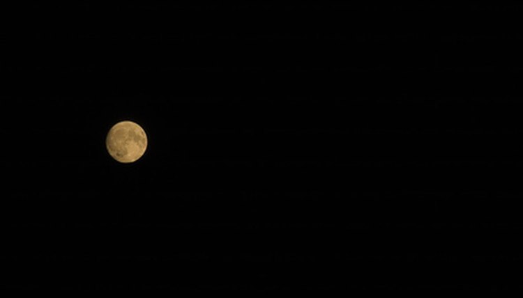 full moon in night sky image by Jorge Moro from Fotolia.com