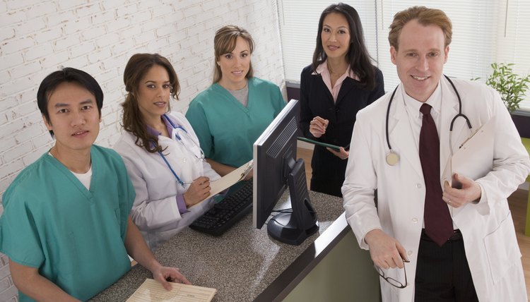 Portrait of medical professionals with businesswoman