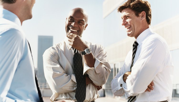 Three Businessmen Laughing Together