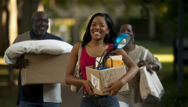 Young woman moving in to Dorm