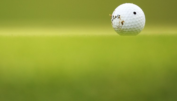 Dirt can cause the ball to roll off line when putting.