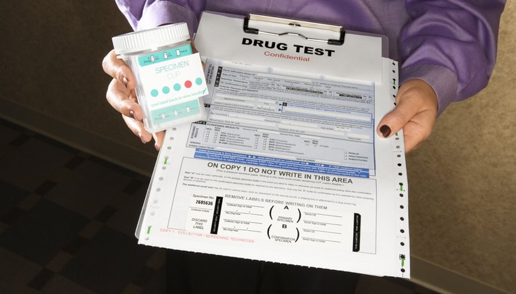 Woman holding clipboard with drug test