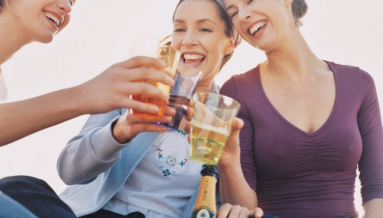 Three Women Drinking Wine