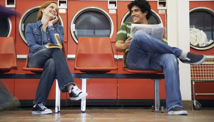Man and Woman Waiting in Laundromat