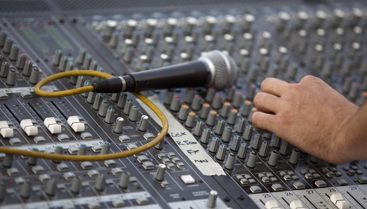 Audio mixer with hand and microphone