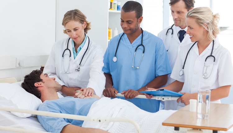 Medical team talking to a patient