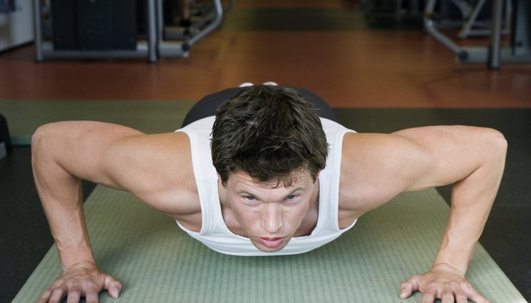 Mid adult man doing push-ups