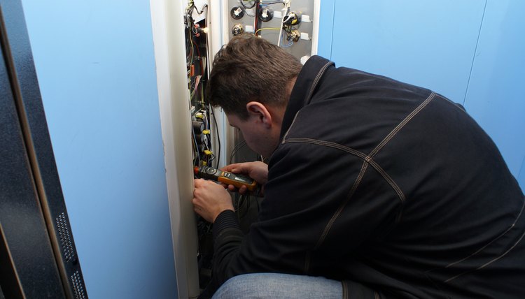 mechanic repairing button