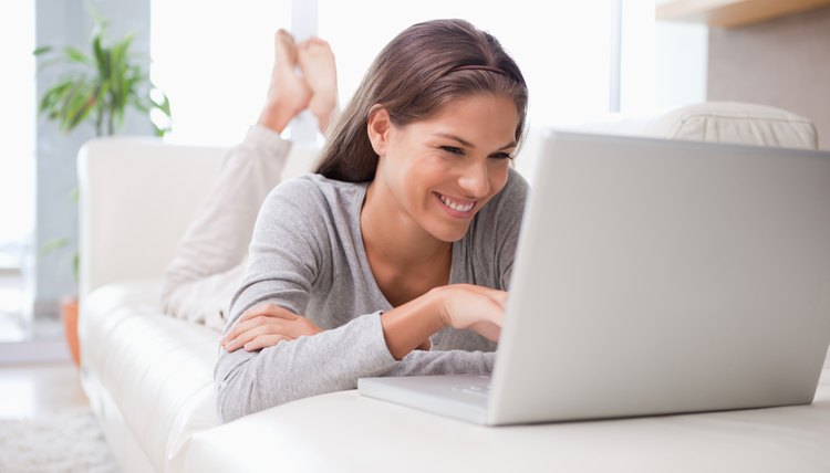 Woman on the sofa chatting online