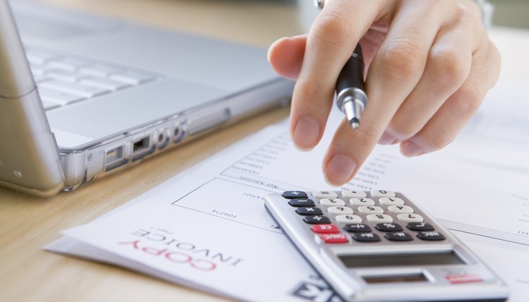 woman calculating savings amount