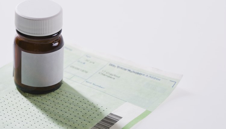 Pill bottle on doctors prescription