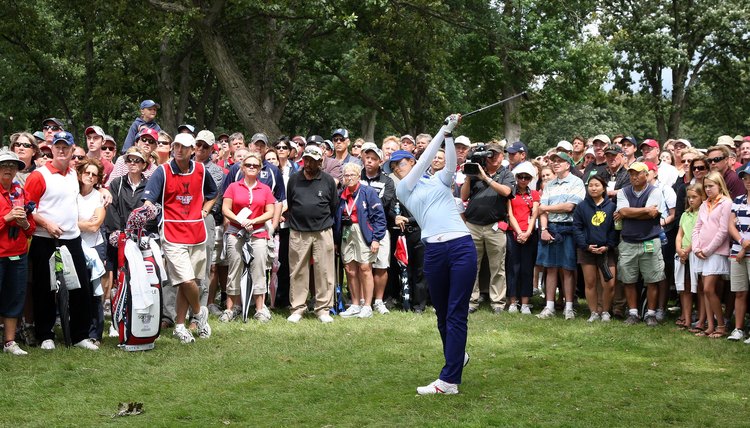 Michelle Wie hits a 3-wood during the 2009 Solheim Cup.