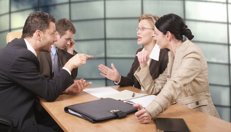 Business negotiations - two men 2 women