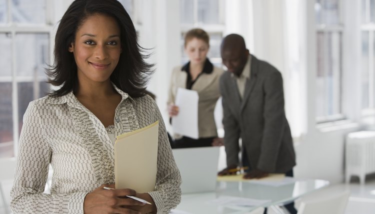 Smiling businesswoman in office
