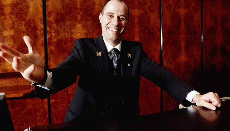 Manager welcoming at hotel reception