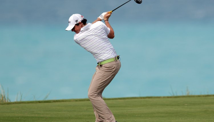 Northern Ireland's Rory McIlroy makes a strong move on the left side of his body to generate a more powerful golf swing.