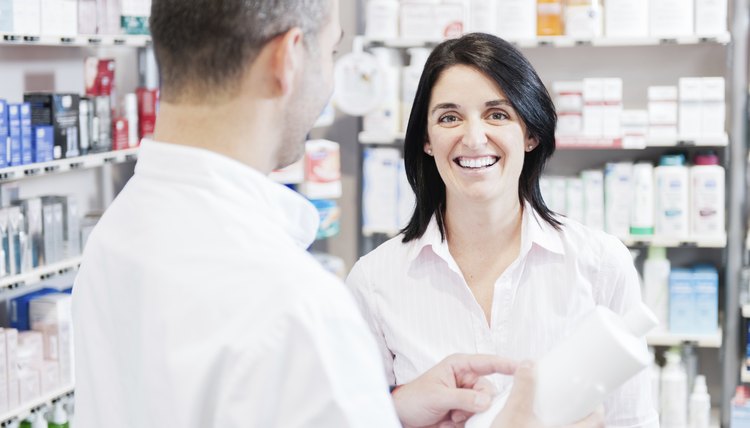 Smiling customer in a pharmacy