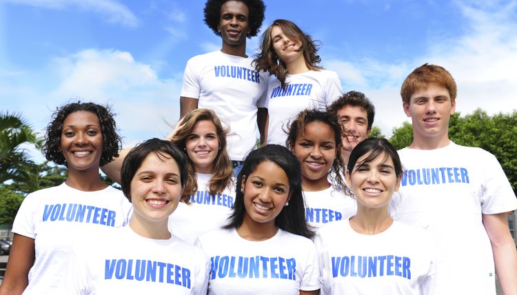 happy multi-ethnic volunteer group
