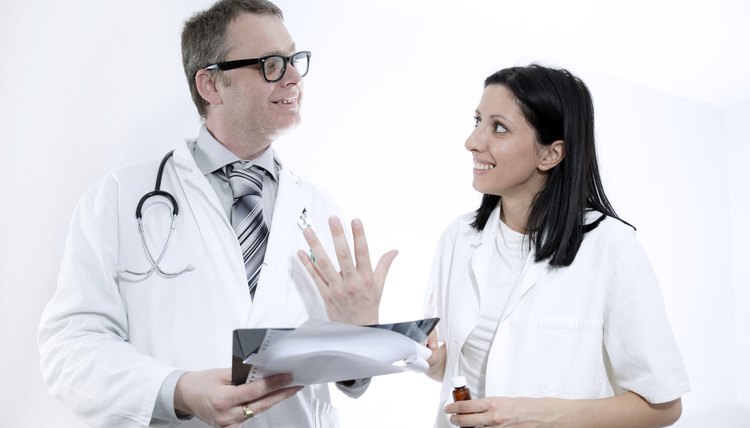 Medical team analyzing X-ray image